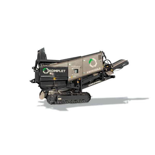 Trituradora movil Komplet Krokodrile de doble eje, ideal para triturar residuos de construccion, escombros, hormigon armado, asfalto y madera, con diseno robusto y sistema de control programable.
