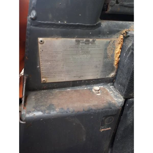Vista de las dimensiones de la minicargadora Fiat Kobelco SL40, óptima para maniobras compactas.