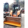 Minicargadora Fiat Kobelco SL40 con motor NH843, ideal para trabajos pesados.